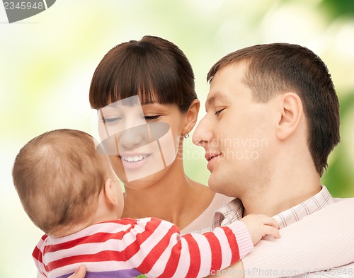 Image of happy mother and father with adorable baby