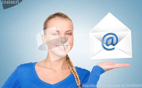 Image of woman showing virtual envelope