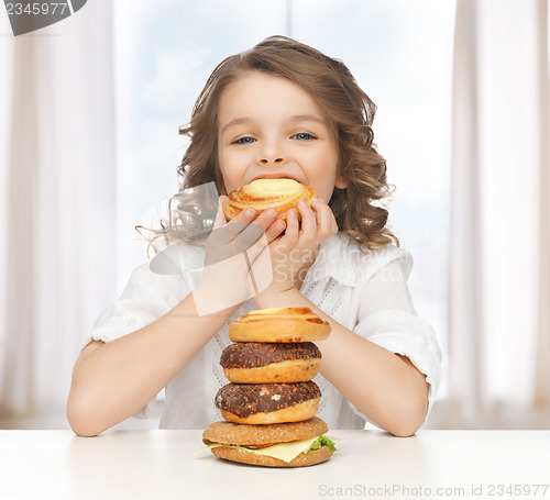 Image of girl with junk food