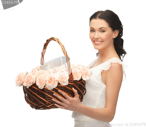 Image of woman with basket full of flowers