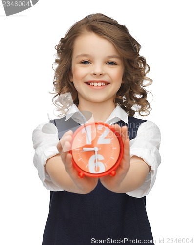 Image of girl with alarm clock