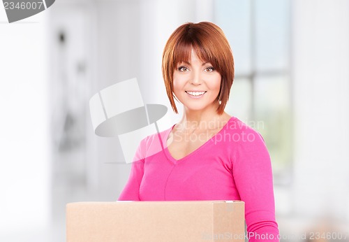 Image of businesswoman with parcel