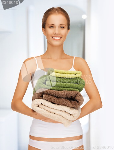 Image of lovely woman with towels