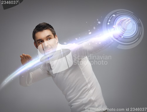 Image of man working with virtual screen