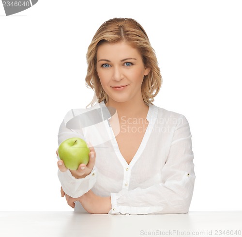 Image of woman with green apple