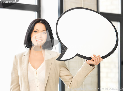 Image of smiling businesswoman with blank text bubble