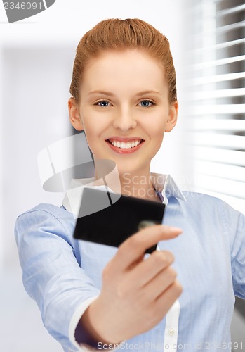 Image of happy woman with credit card