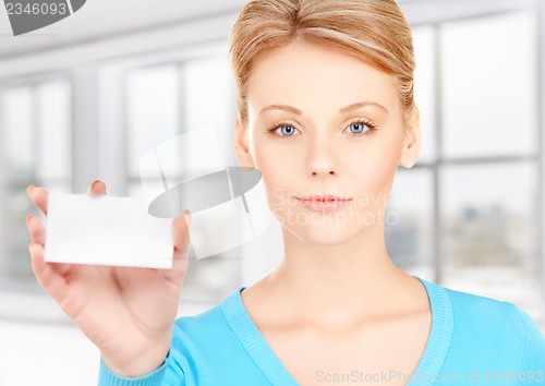 Image of attractive businesswoman with business card