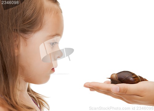 Image of litle girl with snail