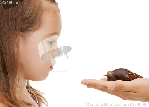 Image of litle girl with snail