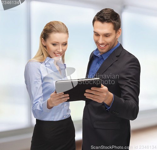 Image of man and woman with tablet pc