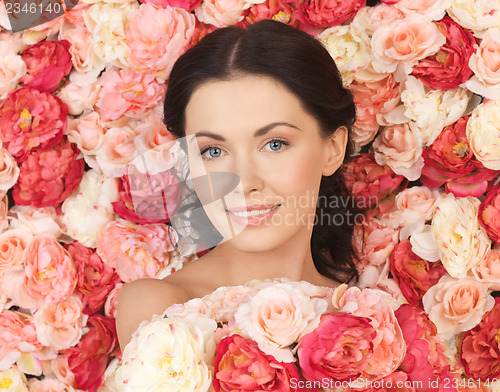 Image of woman with background full of roses