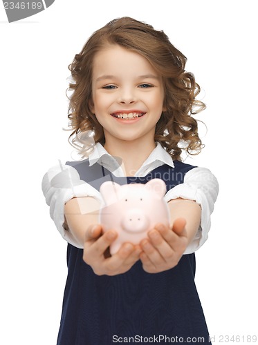 Image of girl with piggy bank