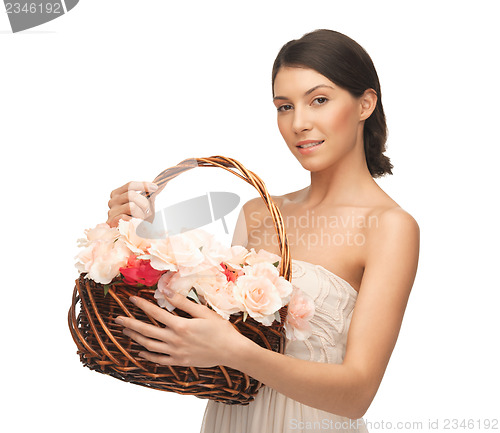 Image of woman with basket full of flowers