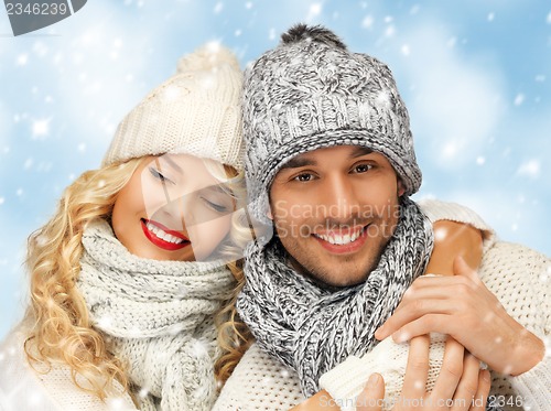 Image of family couple in a winter clothes