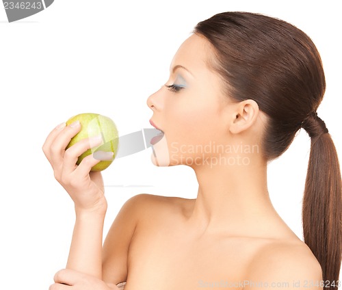 Image of woman in with an apple