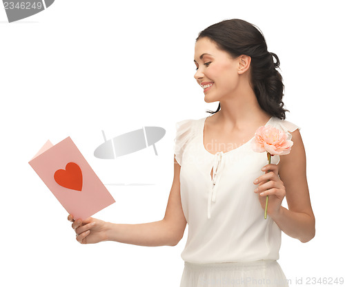 Image of young woman holding flower and postcard