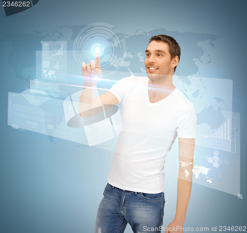 Image of man touching virtual screen