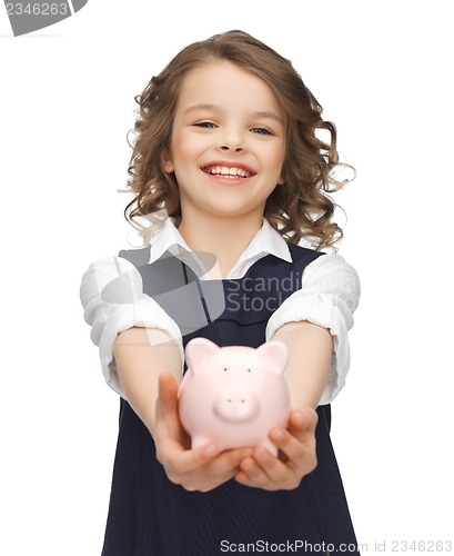 Image of girl with piggy bank