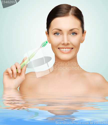 Image of woman with toothbrush