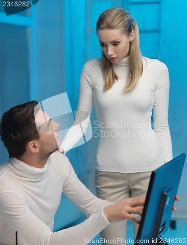 Image of man and woman in laboratory