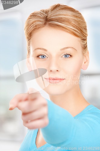 Image of businesswoman pointing her finger