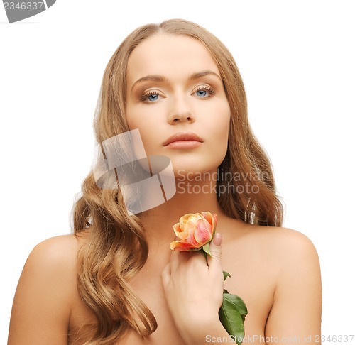 Image of lovely woman with rose flower