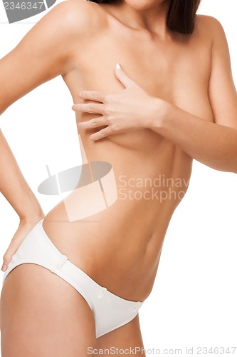 Image of topless woman body