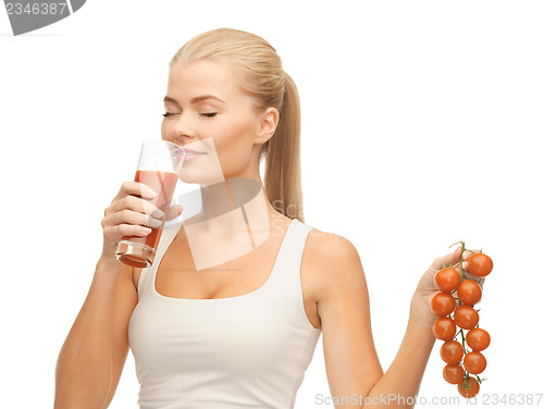 Image of woman drinking tomato juice