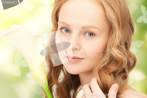 Image of beautiful woman with calla flower