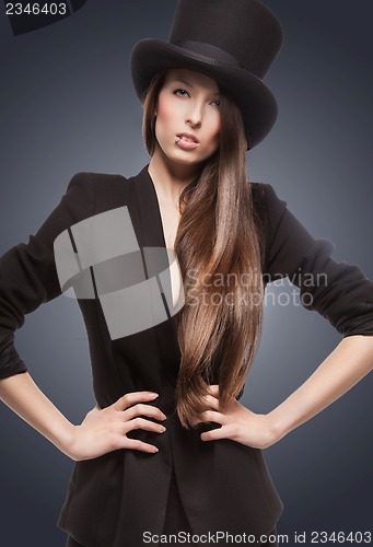 Image of woman in top hat