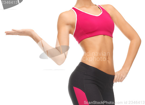 Image of woman trained abs