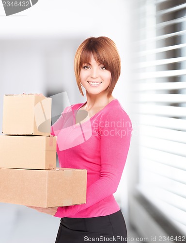 Image of businesswoman with parcels