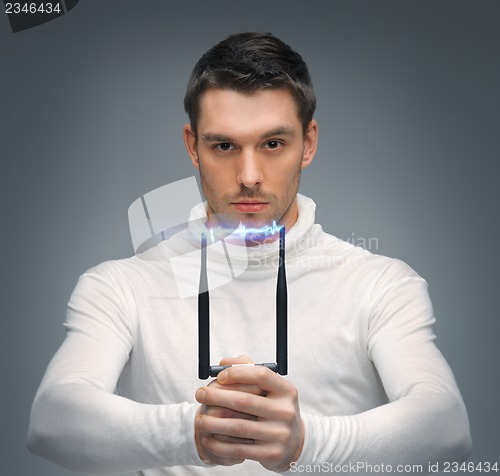 Image of futuristic man with stun gun