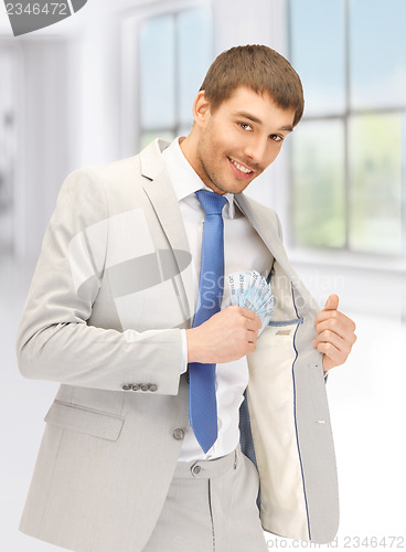 Image of handsome man with euro cash money