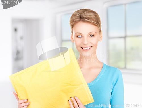 Image of businesswoman with parcel