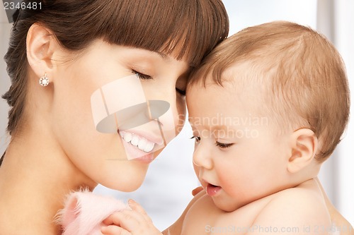 Image of happy mother with adorable baby