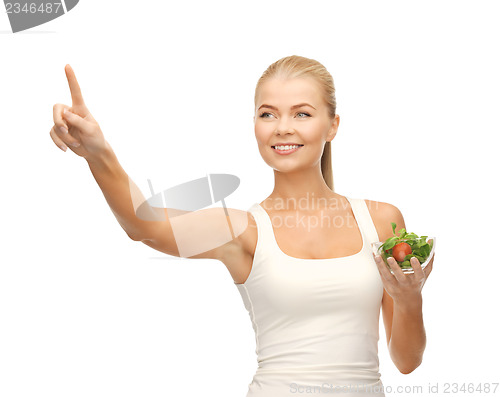 Image of healthy woman holding bowl with salad