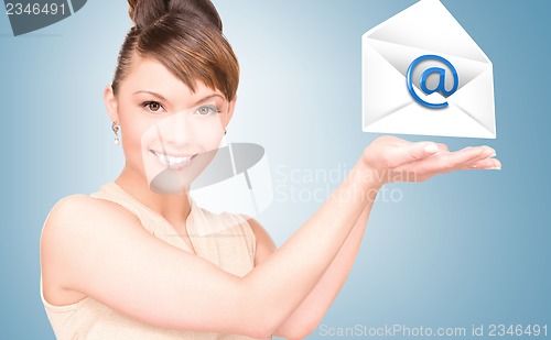 Image of woman showing virtual envelope