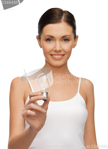 Image of woman with energy saving bulb
