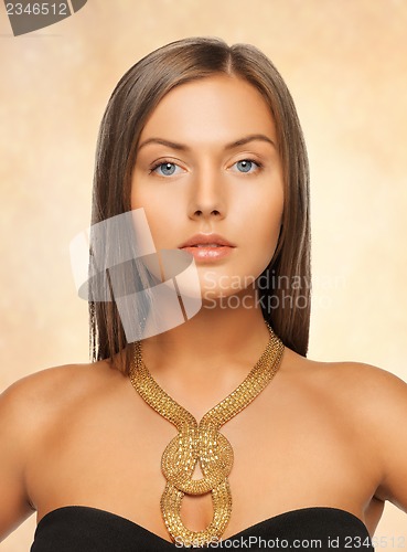 Image of beautiful woman with necklace