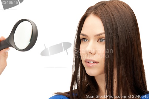 Image of woman with magnifying glass