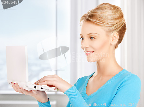 Image of woman with laptop computer