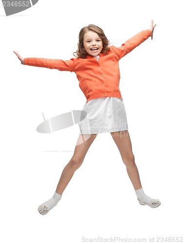 Image of jumping girl in casual clothes