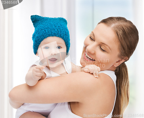 Image of happy mother with adorable baby