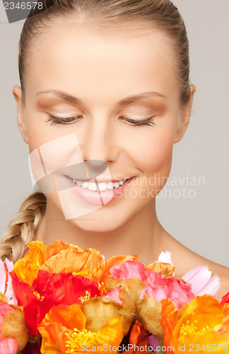 Image of woman with red flowers