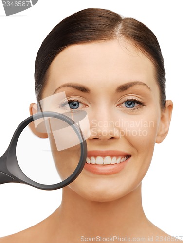 Image of woman with magnifying glass