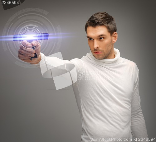 Image of man with sci fi weapon