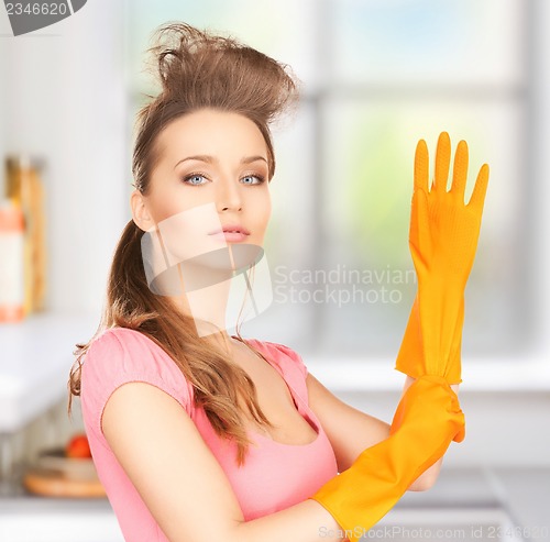 Image of housewife with protective gloves