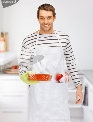 Image of cooking man at kitchen